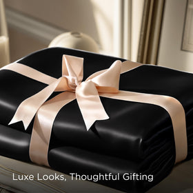 Bedsure black satin sheets set shown as complete ensemble with two pillowcases