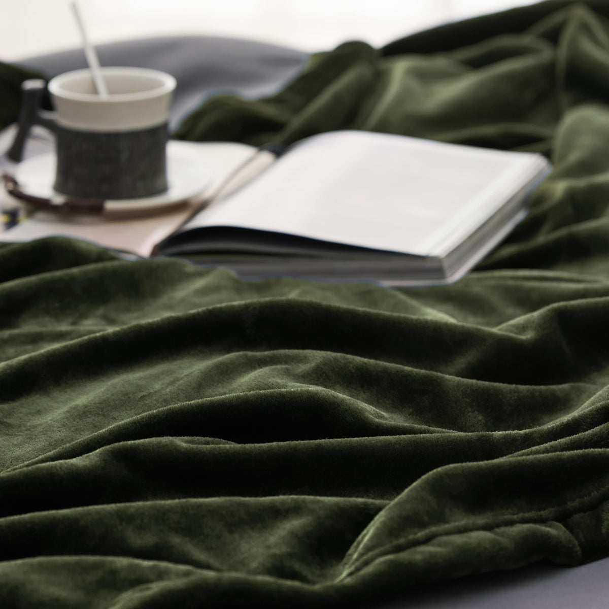 Bedsure pet-friendly olive green blanket ideal for snuggling with pets.