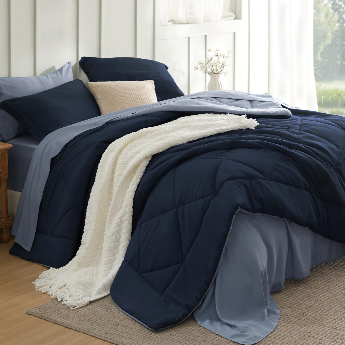 Bedsure blue queen comforter set with flat sheet for all-season warmth and easy styling.