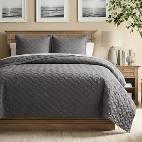Bedsure California King quilt with basket weave in grey on bed for year-round comfort.