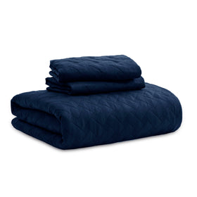 Bedsure California King quilt draped over bed emphasizes generous size.