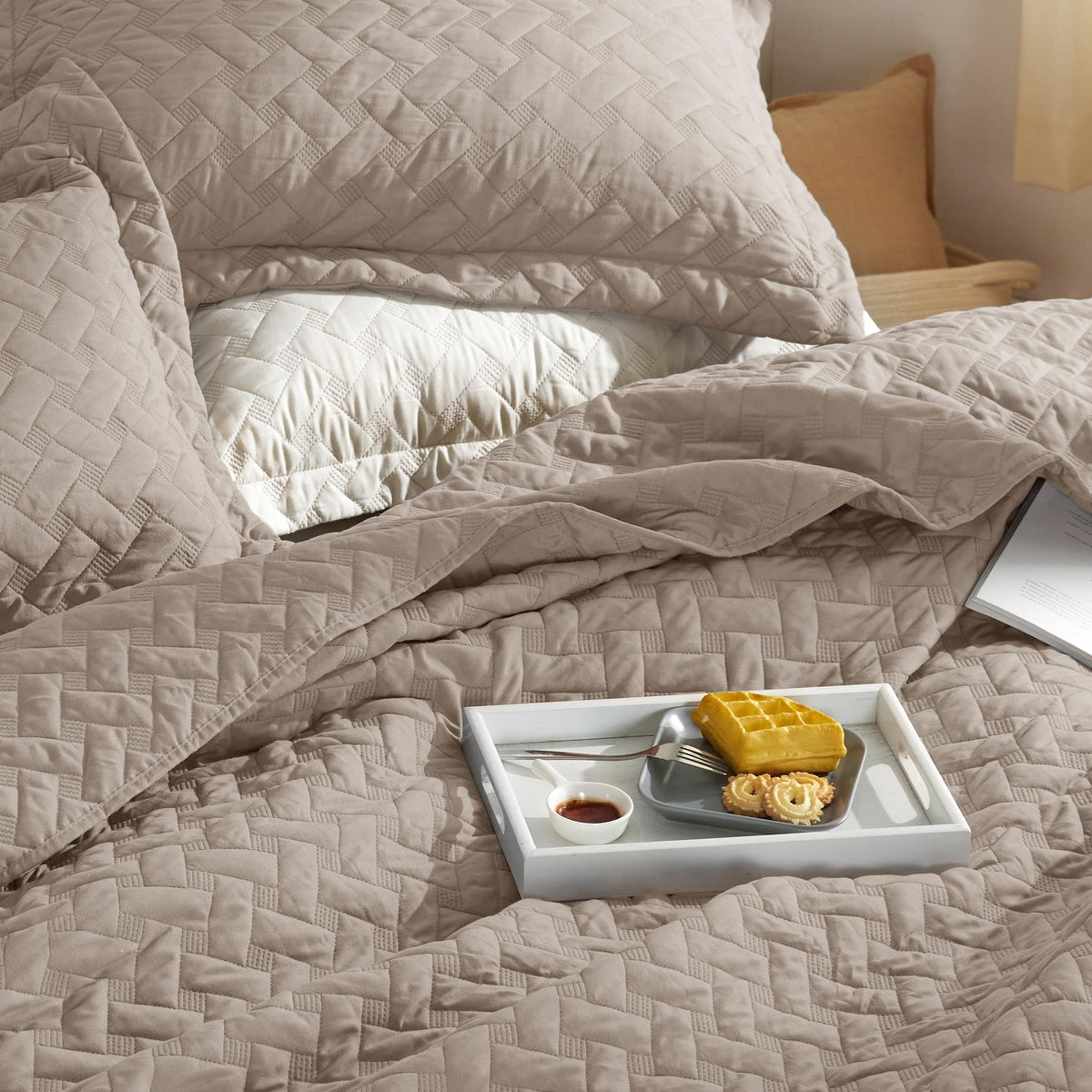 Bedsure California King quilt in taupe adds versatile warmth to any bedroom.