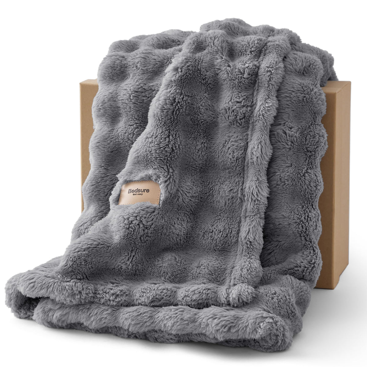 Bedsure CloudBubble 3D texture blanket on couch adds cozy visual interest.
