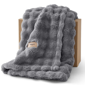 Bedsure CloudBubble 3D texture blanket on couch adds cozy visual interest.