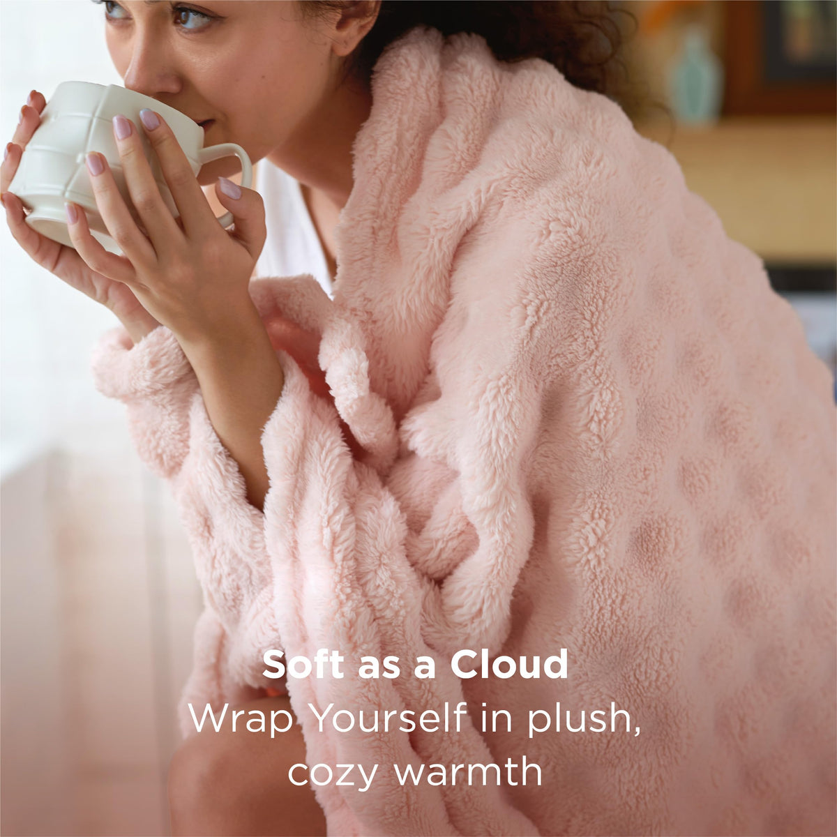 Bedsure cloudbubble texture blanket adds cozy visual appeal to the sofa.