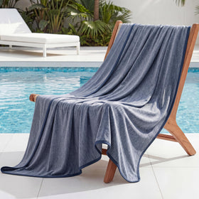 Bedsure cooling blanket navy blue on bed showing cool-to-touch sensation