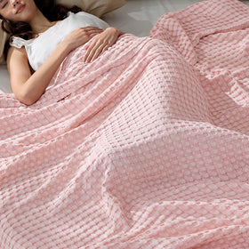 Bedsure cooling cotton waffle blanket in spring pink, breathable for hot sleepers.