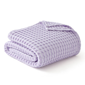 Bedsure cooling cotton waffle blanket folded on bed, showcasing versatile queen size.