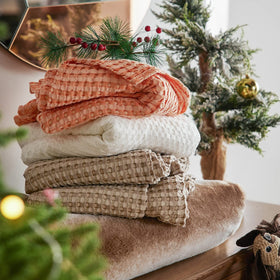 Bedsure navy throw enhancing decor while staying breathable.