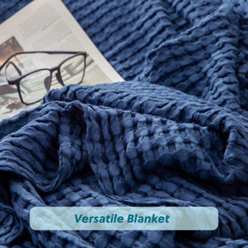 Bedsure navy blanket on couch adds casual elegance.