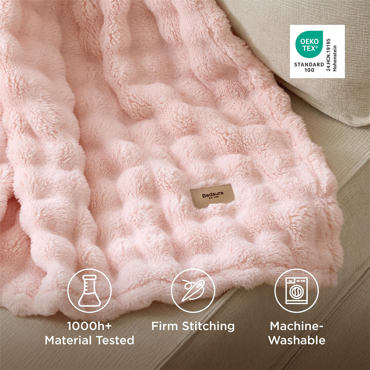 Bedsure couch and bed decor blanket adds texture and a soft pink focal point.