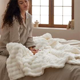 Bedsure couch-decor blanket layered on a sofa enhances room style.