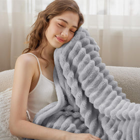 Bedsure Cozy blanket draped over chair demonstrates ready warmth