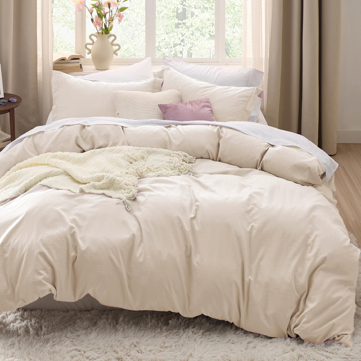 Bedsure cream oversized king duvet cover close-up shows soft, breathable fabric for comfort.