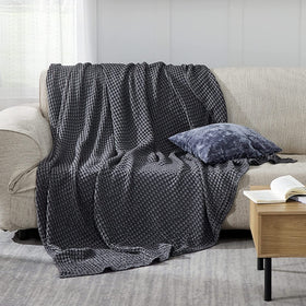 Bedsure dark grey king blanket neatly folded to reveal color.