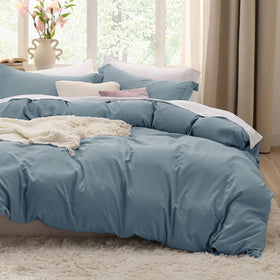 Bedsure dusty blue oversized king duvet cover shows rich color for a luxurious bed