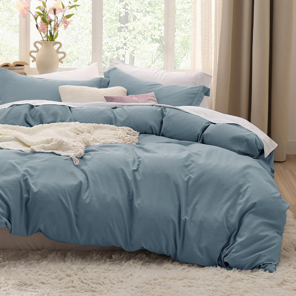 Bedsure dusty blue oversized king duvet cover shows rich color for a luxurious bed