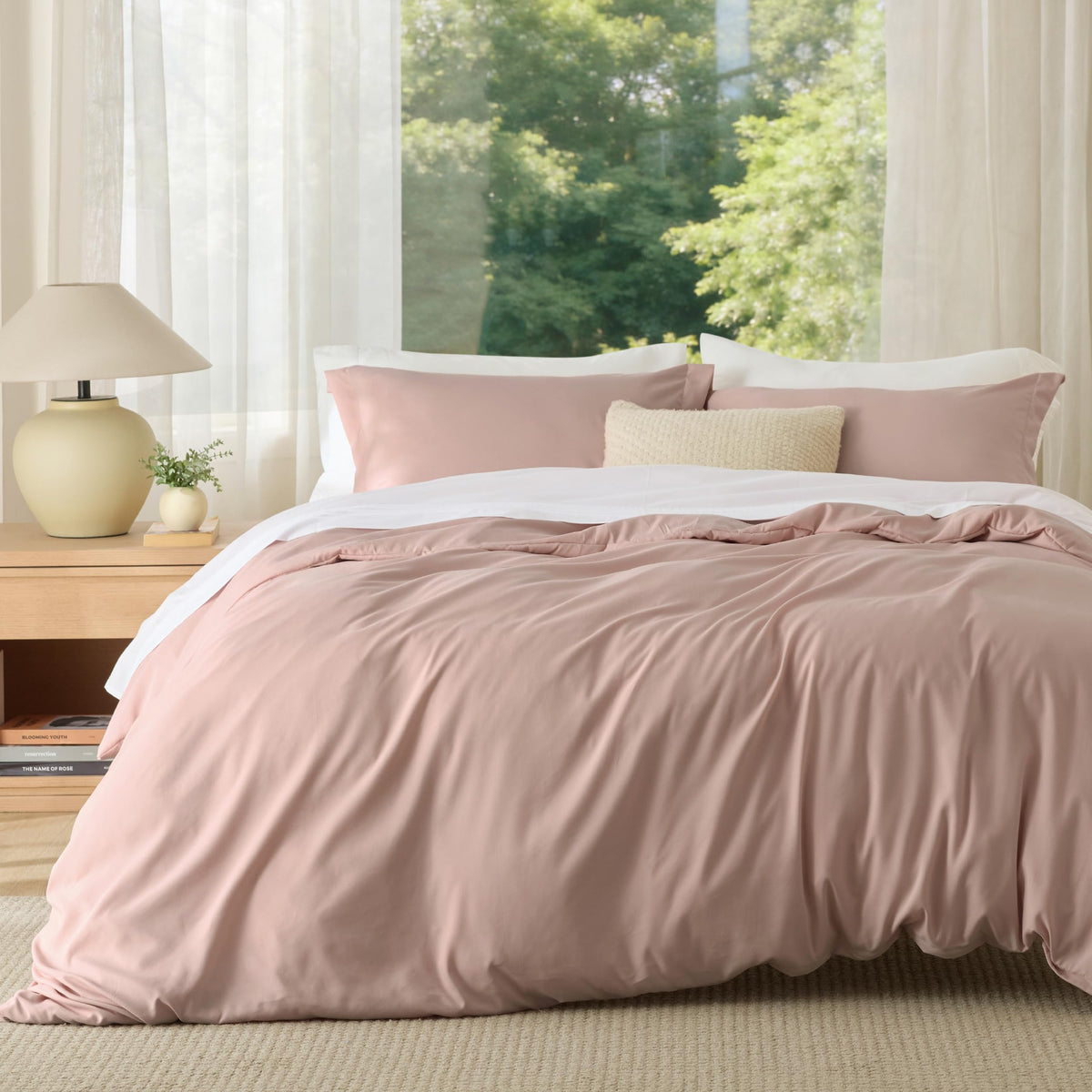 Bedsure queen duvet cover in dusty rose on bed, showing soft microfiber comfort