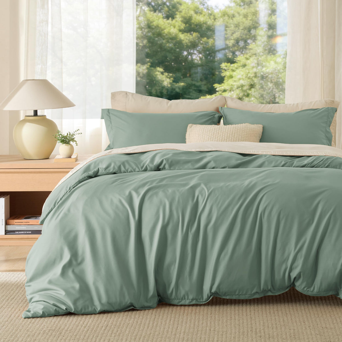 Bedsure queen duvet cover sage green folded, highlighting soft microfiber texture.