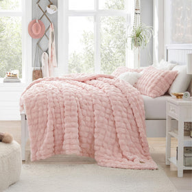 Bedsure easy-care pink blanket stays fluffy wash after wash.