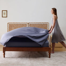 Bedsure flat sheet 108x102 on bed with generous drape.