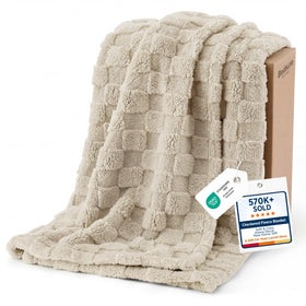 Bedsure GentleSoft beige throw closeup of ultra-soft microfiber for cozy evenings.