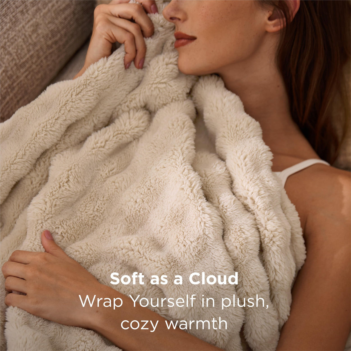 Bedsure gentlesoft beige throw close-up shows ultra-soft plush handfeel.