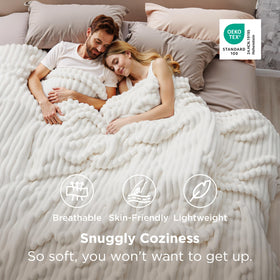 Bedsure GentleSoft blanket spread over a bed showing generous 120x120 inches.