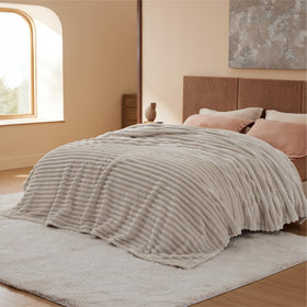 Bedsure GentleSoft queen throw offers cozy comfort during bedtime rituals