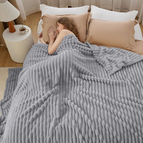 Bedsure GentleSoft blanket on couch illustrating versatile lounging use
