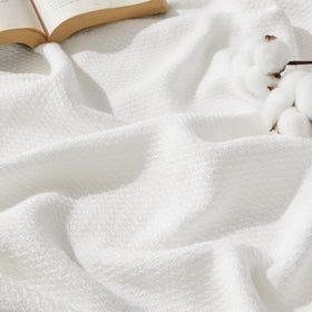 Bedsure GentleSoft blanket herringbone closeup shows breathable cotton for summer comfort