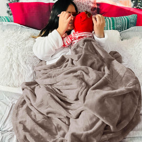 Bedsure GentleSoft blanket ideal for camping trips or picnic lounging