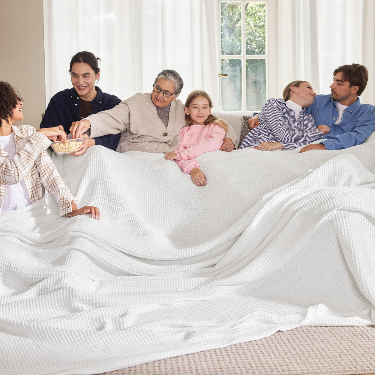 Bedsure Gentlesoft blanket on an oversized king bed highlights breathable cotton comfort.