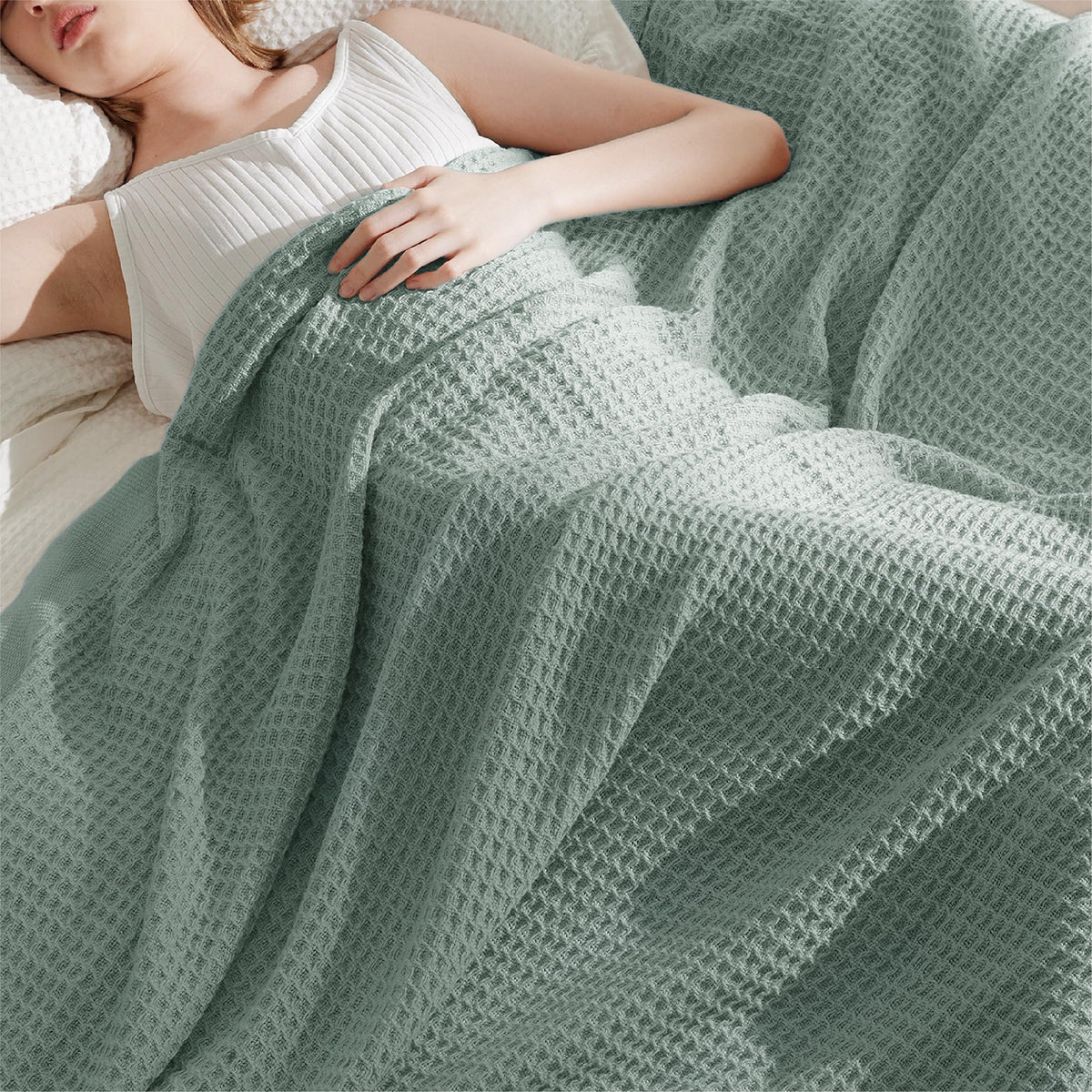 Bedsure Gentlesoft blanket on bed highlights sage green color and soft drape for relaxing evenings