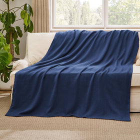 Bedsure GentleSoft navy blanket showcased in a dorm setting for everyday comfort.