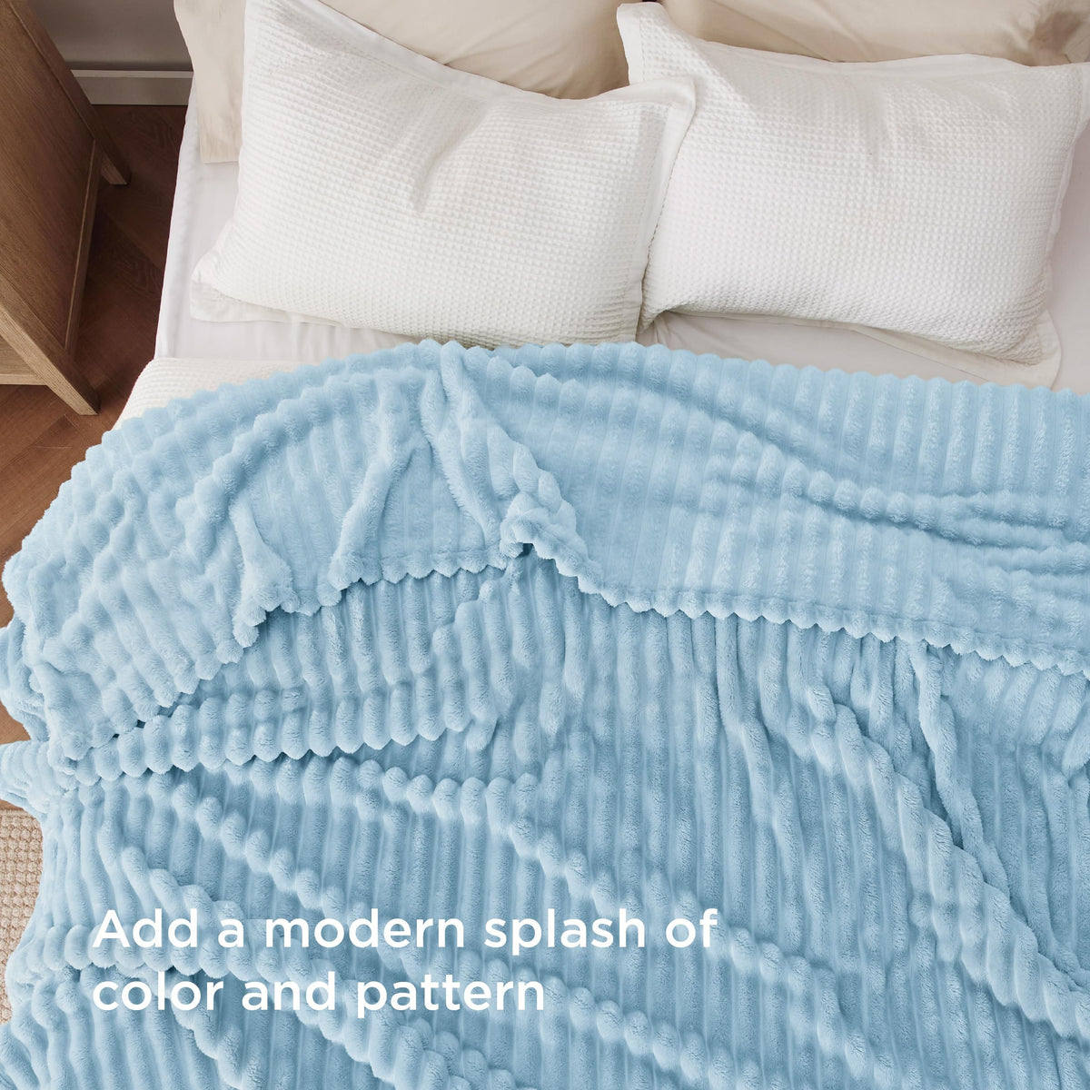 Bedsure GentleSoft blue fleece blanket striped pattern complements decor with subtle elegance