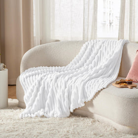 Bedsure GentleSoft throw on bed invites evening relaxation.