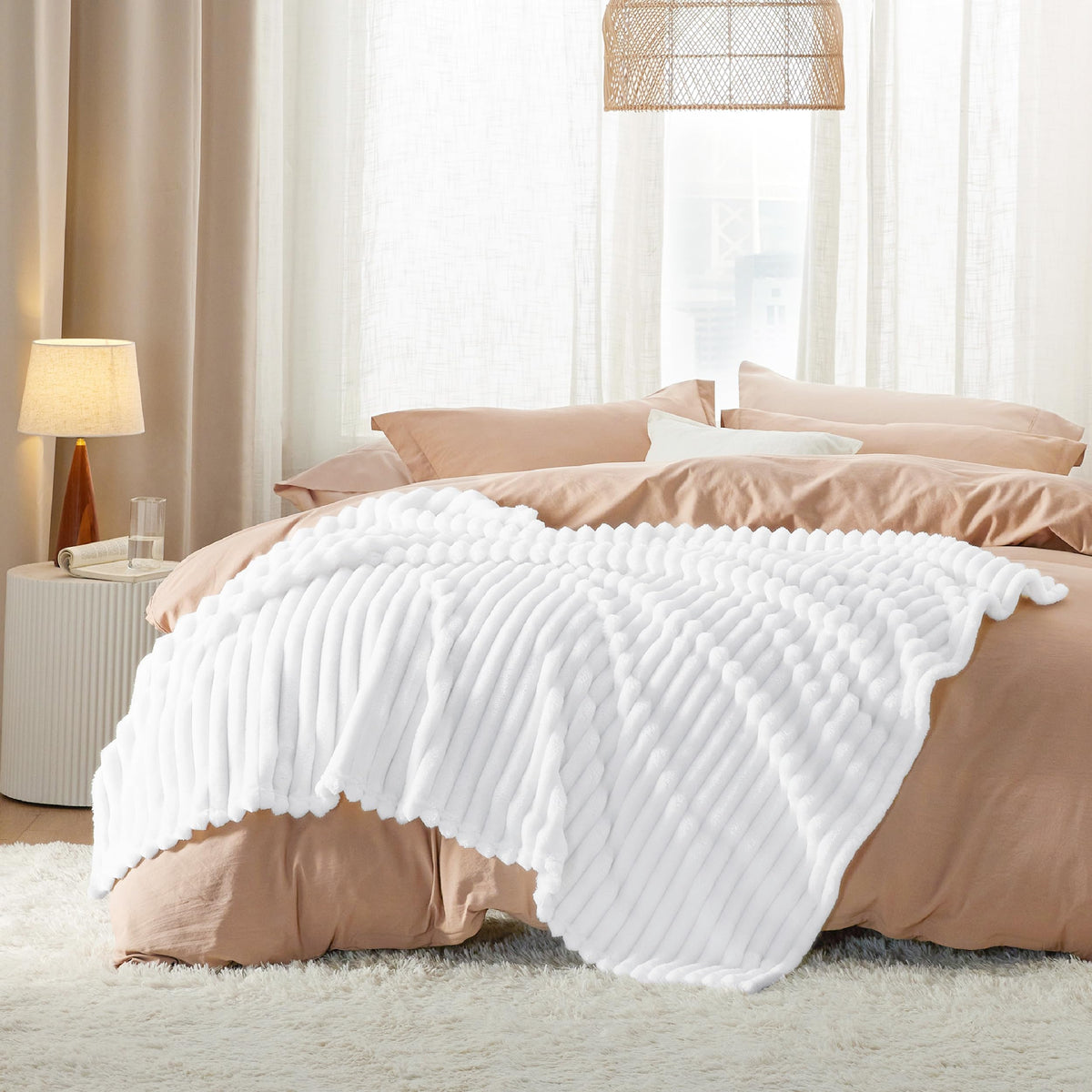 Bedsure GentleSoft blanket for lounging during movie night.
