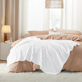 Bedsure GentleSoft blanket for lounging during movie night.