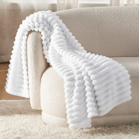 Bedsure GentleSoft throw on couch highlights versatile everyday warmth.