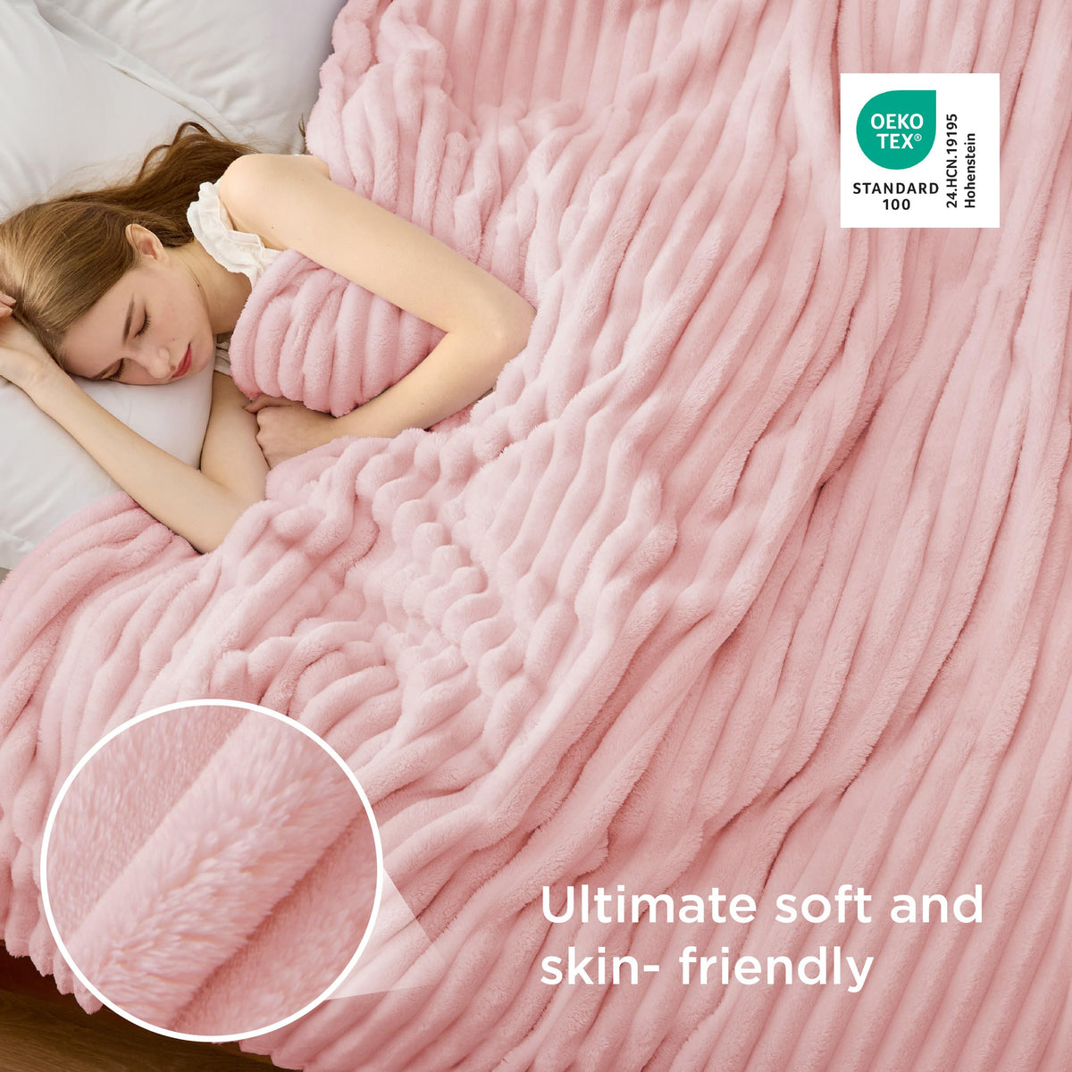 Bedsure GentleSoft coral pink blanket draped over sofa for relaxed style.