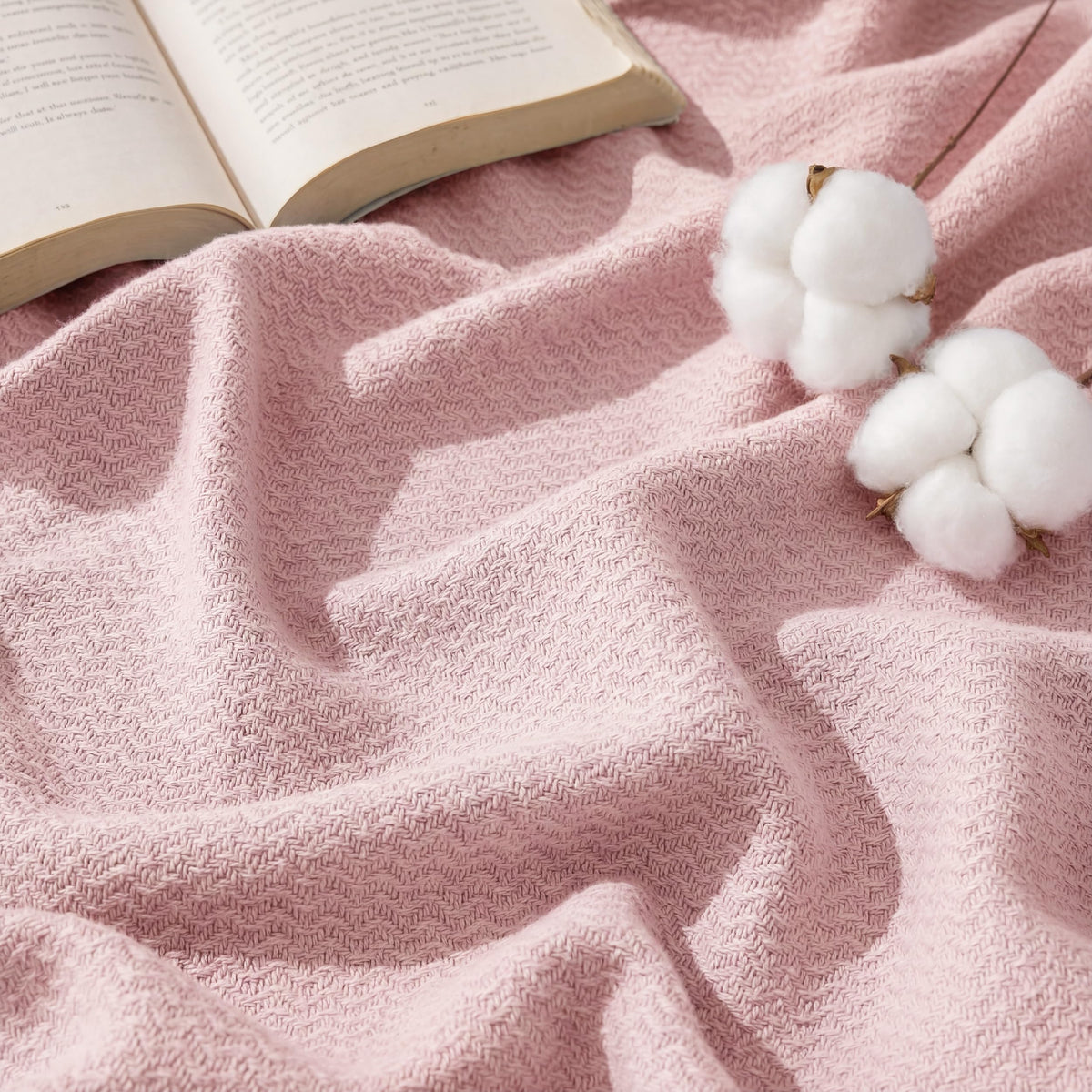Bedsure GentleSoft cotton throw close-up shows herringbone texture and softness