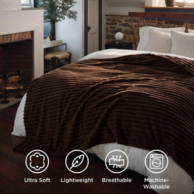 Bedsure GentleSoft throw worn by a person to emphasize light warmth