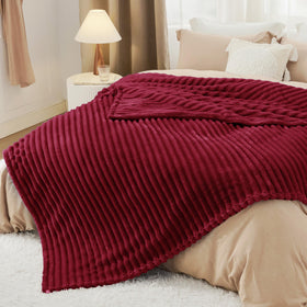 Bedsure GentleSoft Deep Red Blanket wrapped for a cozy evening.