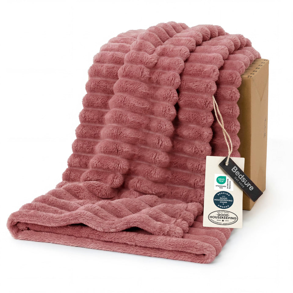 Bedsure GentleSoft dusty pink fleece throw on couch for cozy lounging