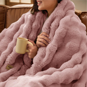 Bedsure GentleSoft Dusty Rose Throw with bubble pattern adds cozy texture to any room
