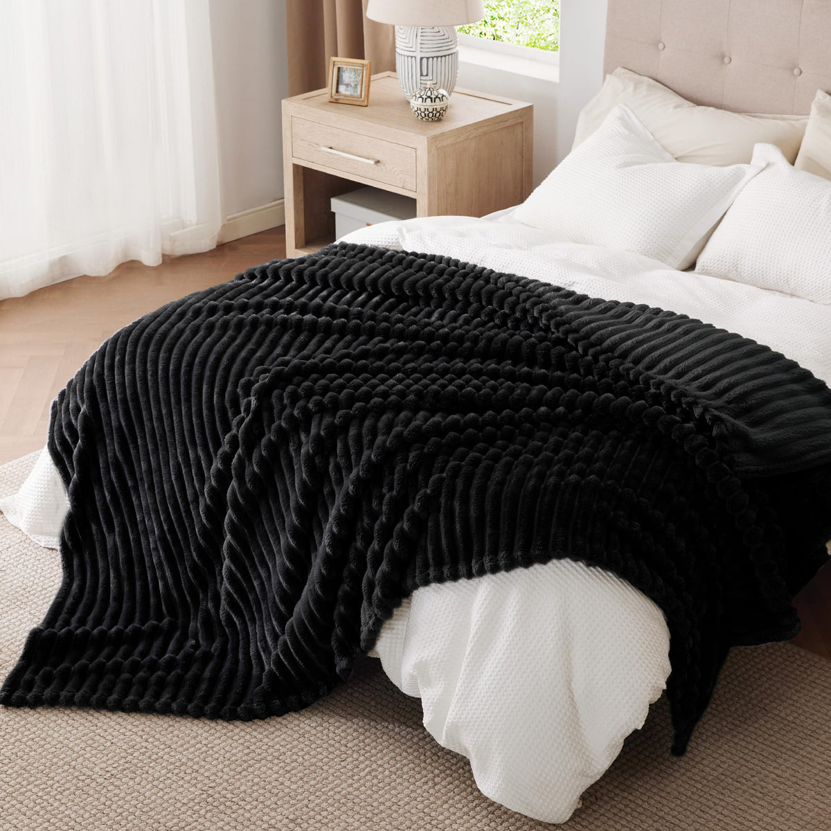 Bedsure GentleSoft black blanket dye retention keeps colors vibrant after washing.