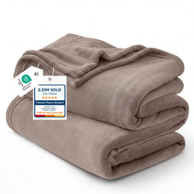 Bedsure GentleSoft fleece blanket in mocha brown on a bed for cozy warmth