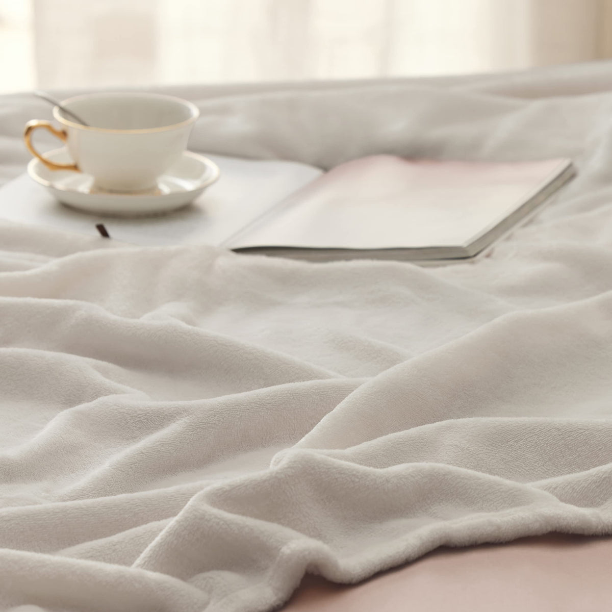 Bedsure GentleSoft fleece blanket in bed for night-time snuggles.