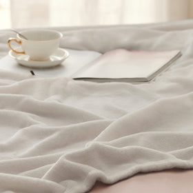 Bedsure GentleSoft fleece blanket in bed for night-time snuggles.